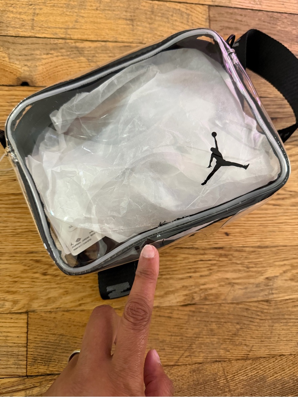 Jordan Clear Crossbody Bag with Black Trim dent in front  when empty